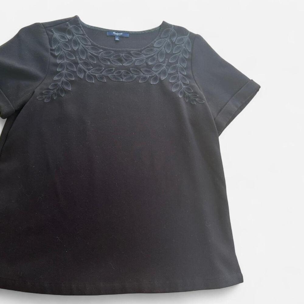 Madewell black top with leaf embroidery. Size S